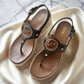 Keilförmige Sandalen – Braun und Monogramm – Michael Kors